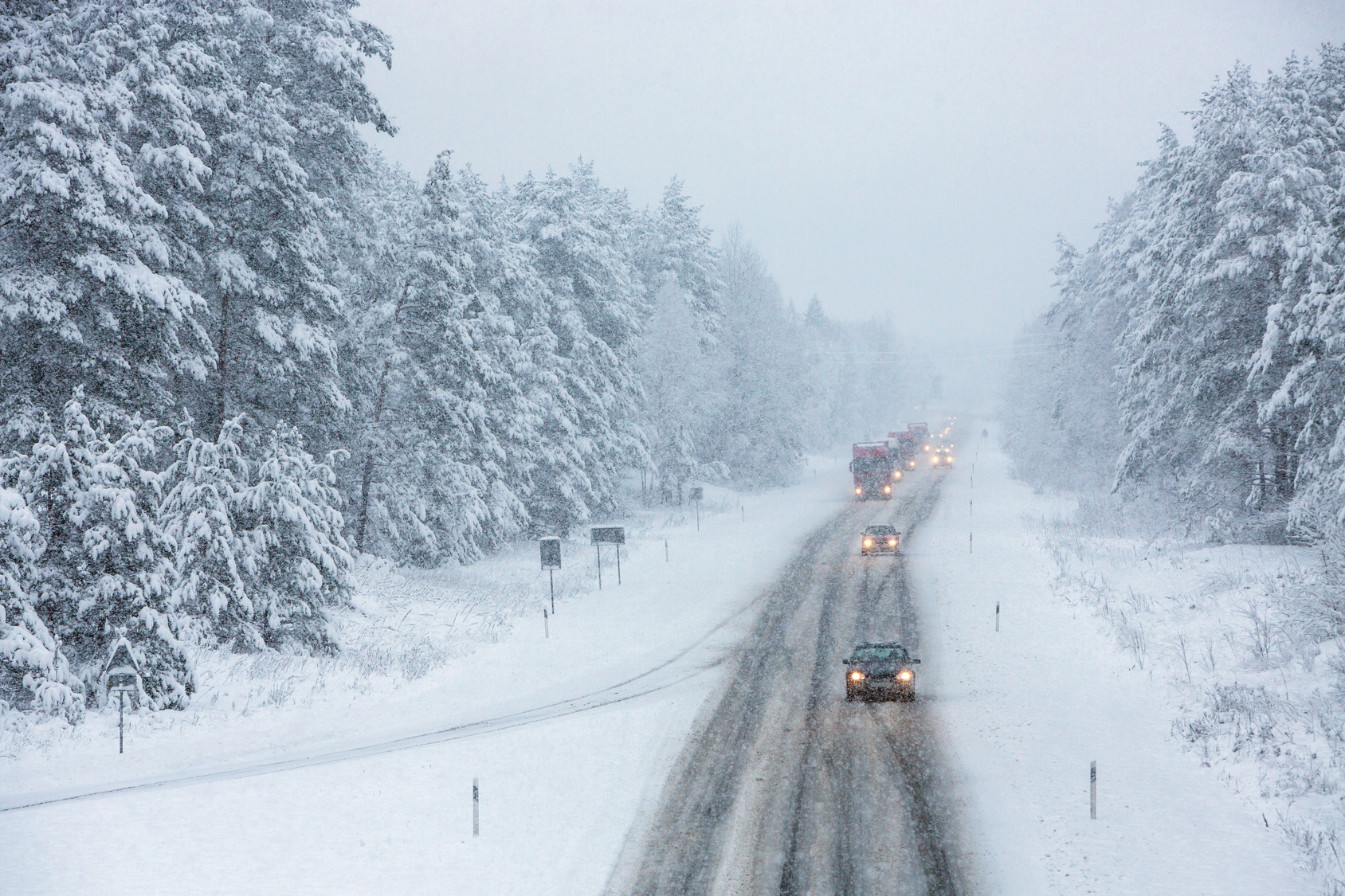 Several cars on a winter road